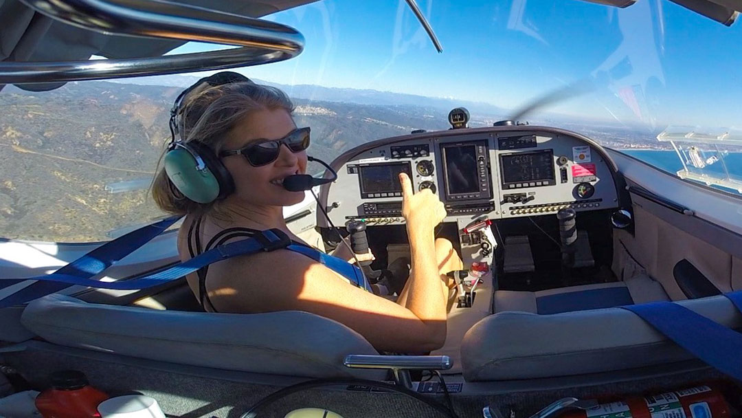 From Down to Positive - Alicia Ruelez Maher piloting airplane